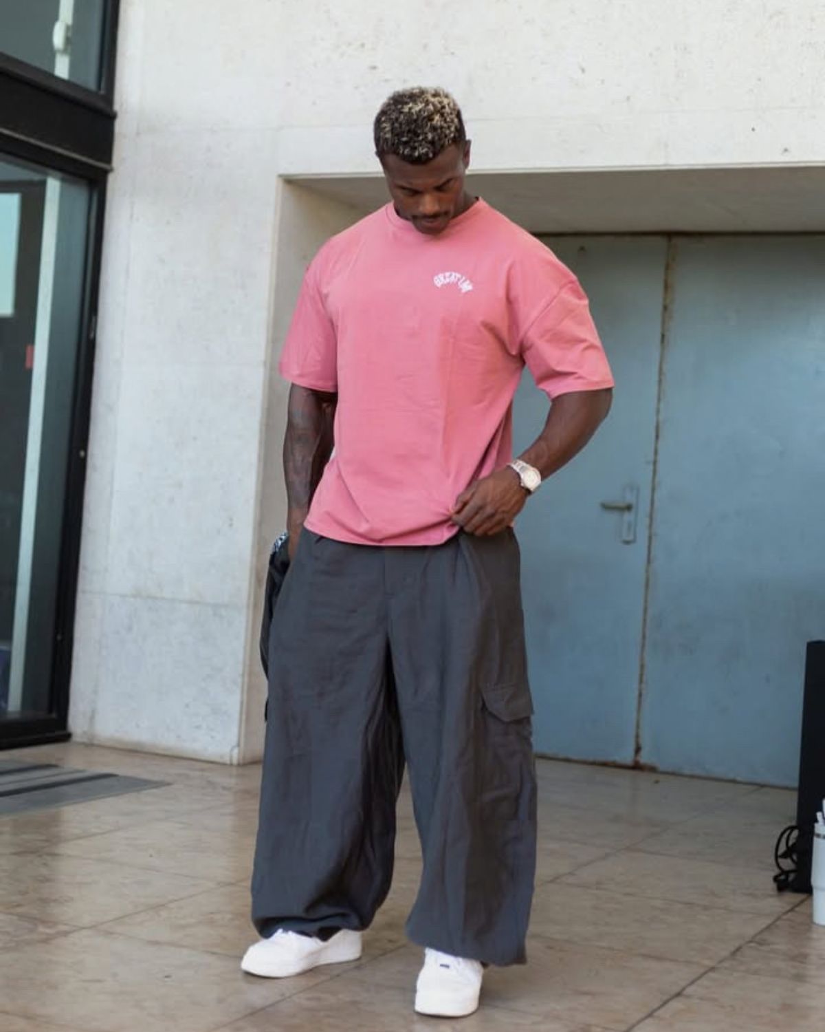 Denis Rose wearing the Oversized T-Shirt Not Given Mauve